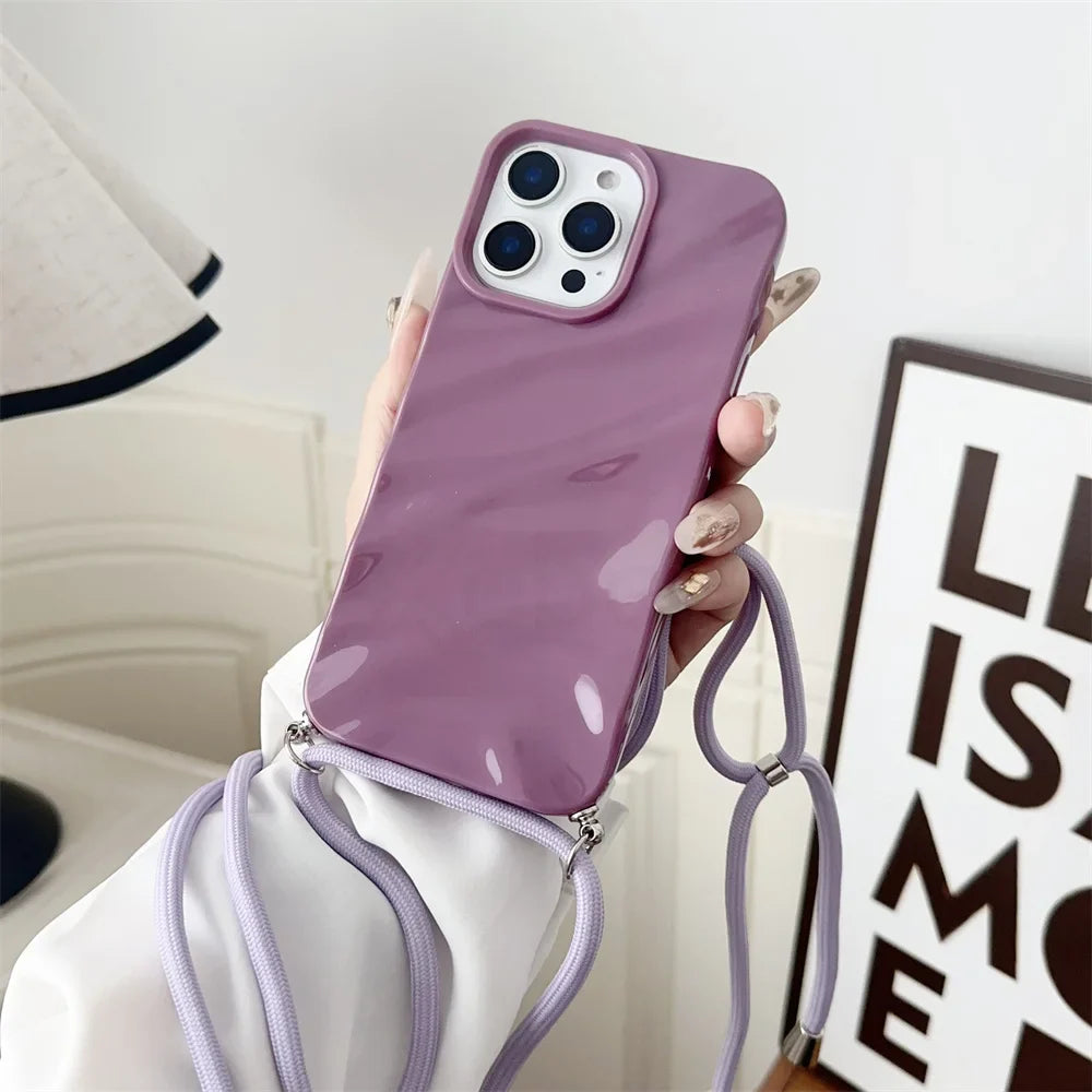 Purple phone case with lanyard.