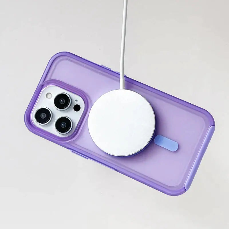 a purple phone case with a white phone in it