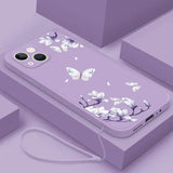 a purple phone case with white flowers on it