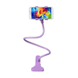 a close up of a cell phone on a stand with a purple cord