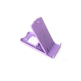 a purple phone stand with a white background