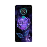 a purple rose with stars and a green ring on it