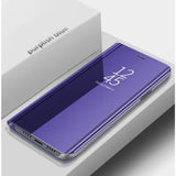 the back of a purple samsung phone with a box