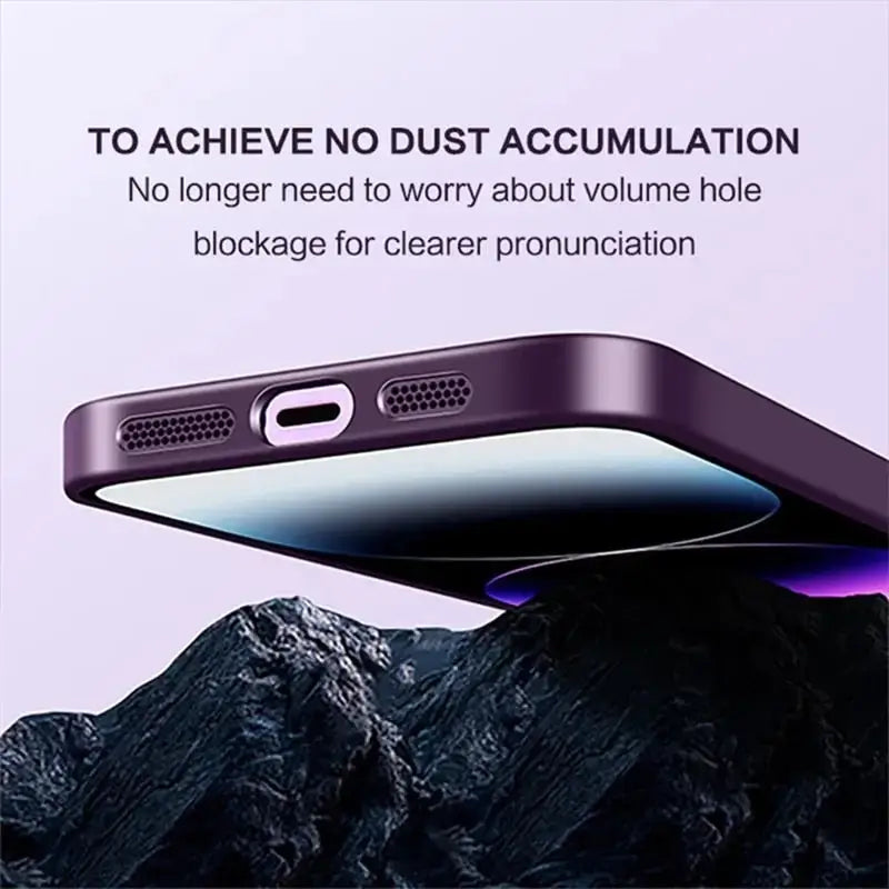 the back of a purple phone with a mountain in the background