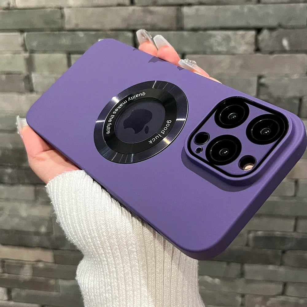 Purple silicone iPhone case with a MagSafe ring and camera protection.