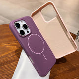 Purple silicone iPhone case with a Magsafe ring and a soft inner lining.