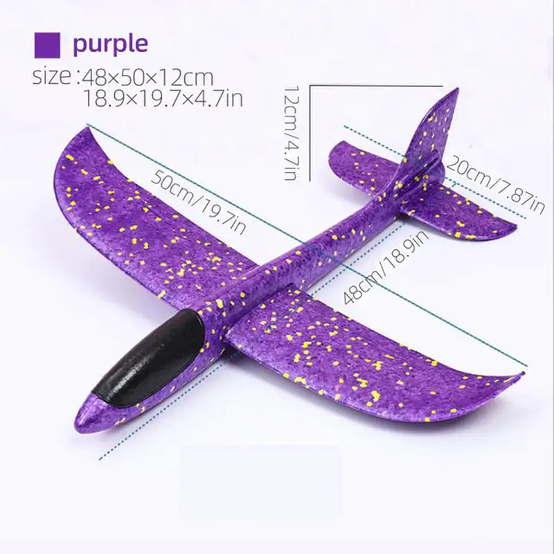 a purple airplane with gold stars on it