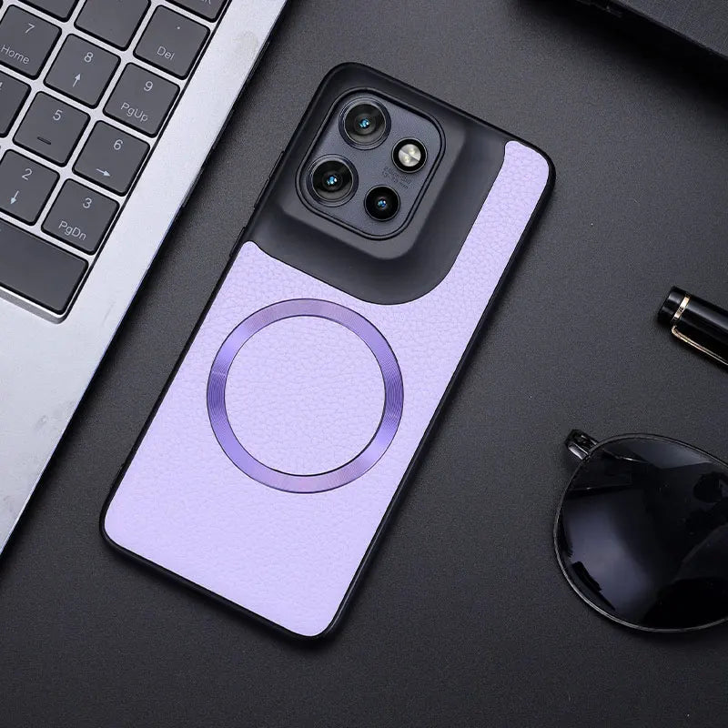 Purple smartphone case with a black camera module section and a circular magnetic ring.
