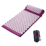 a purple and white mat with a black bag