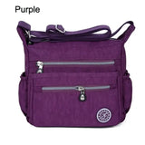 purple shoulder bag