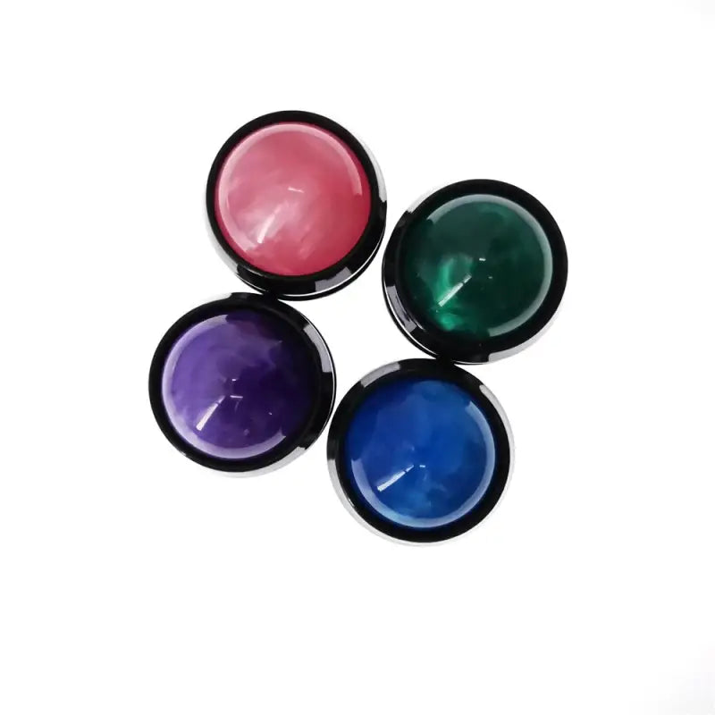 a set of four different colored paints