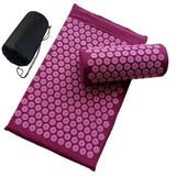 a close up of a yoga mat and a bag on a white background