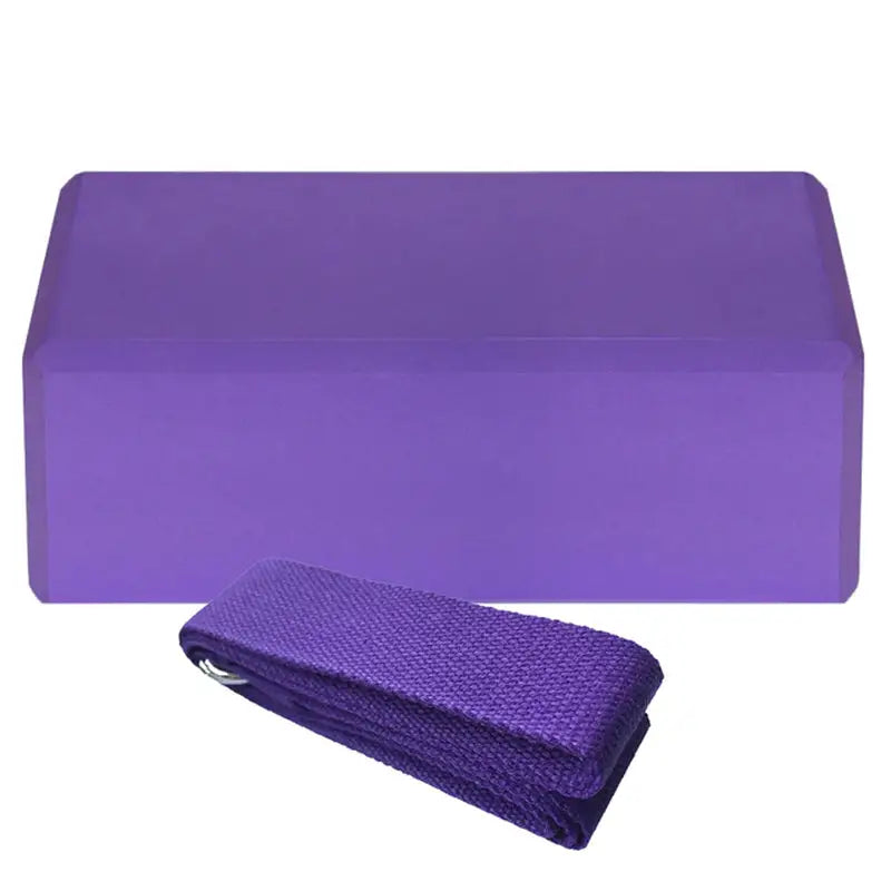 a purple yoga mat with a purple towel