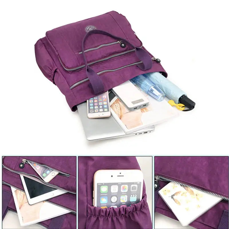 purple bag with multiple compartments and a phone inside