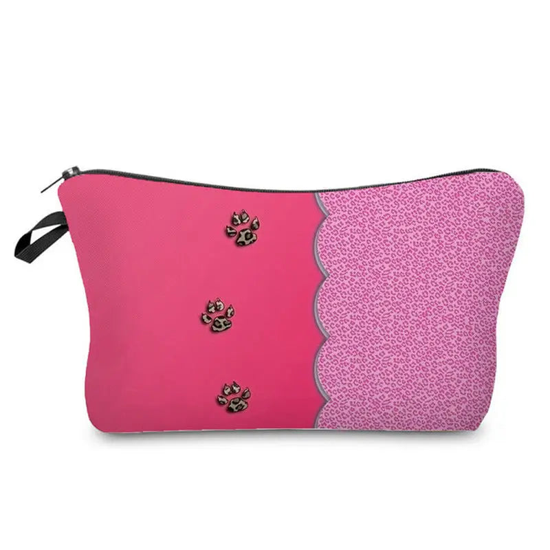 a pink cosmetic bag with a leopard print on the front