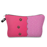 a pink cosmetic bag with a leopard print on the front