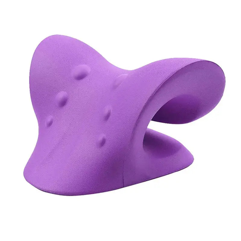 purple plastic object with a curved shape on a white background