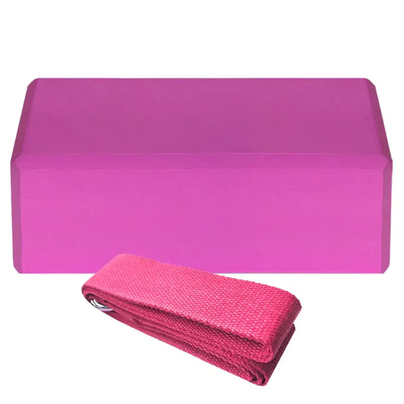 a close up of a pink box with a towel on it