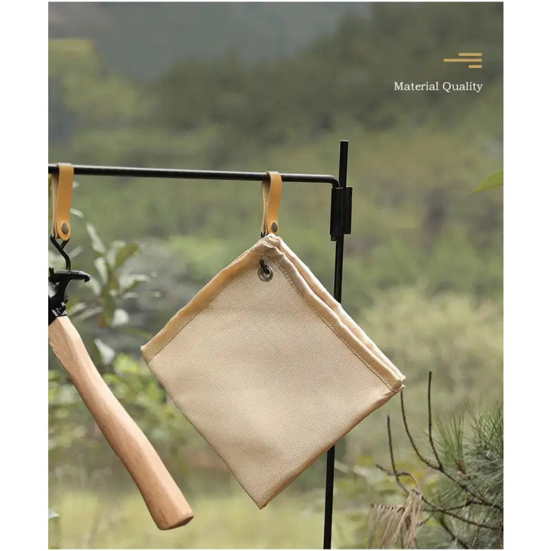 a bag hanging on a clothes rack