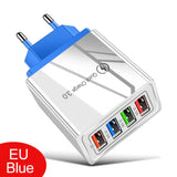 a white and blue usb charger with four different colors