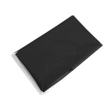 a black envelope with a white envelope inside