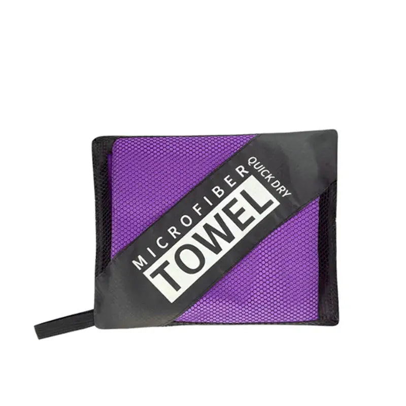 a close up of a purple towel with a black stripe