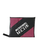 a pink and black pouch bag with the words,’micro towel ’