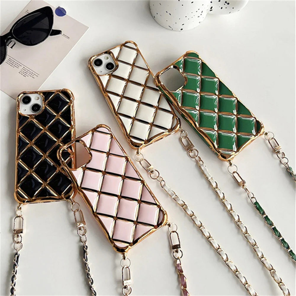 Quilted phone cases with chain straps.