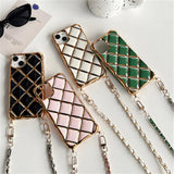Quilted phone cases with chain straps.