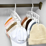 a hat rack with hats hanging on it