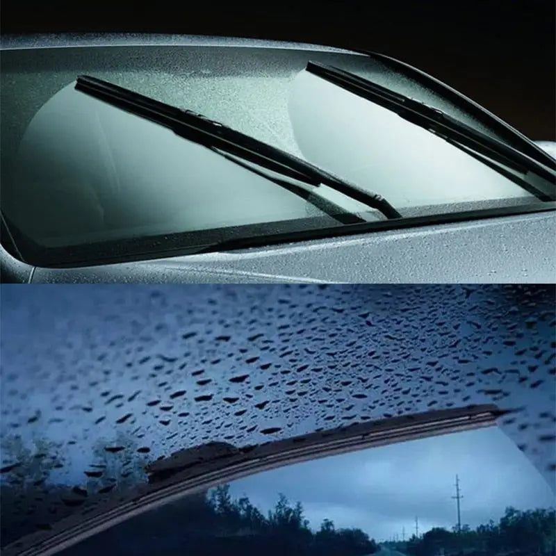 a car with rain on the windshield