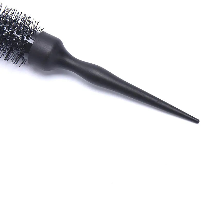 a black brush with a black handle