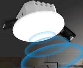 Recessed LED ceiling light with spring clips.