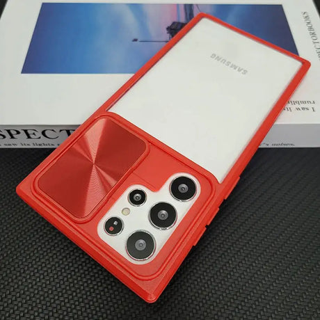 A red case with two buttons and a white cover