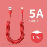 a red coiled cable with a white button