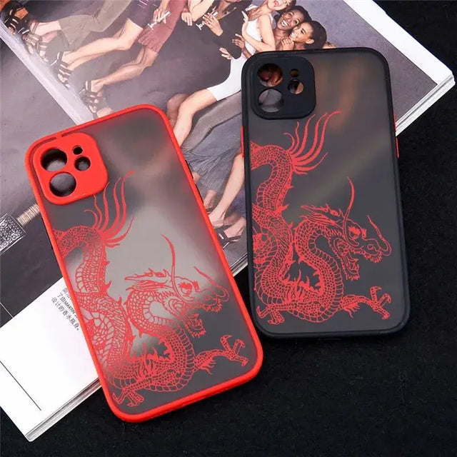 a red dragon phone case with a black background