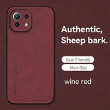 The back of a red iphone case with the text, `,’’, ’, ’, ’