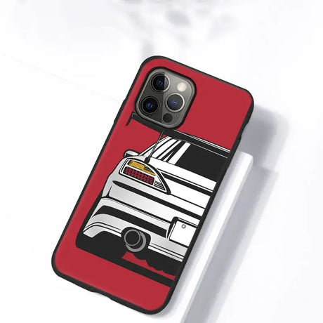 A red iphone case with a white car on it