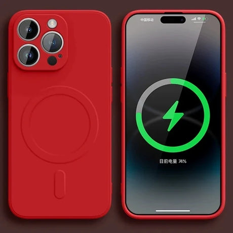 Red iPhone with MagSafe charging capability, displaying a battery charging icon on its screen.