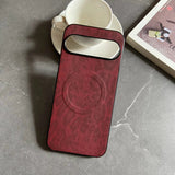 Red leather phone case with a circular magnetic charging area.