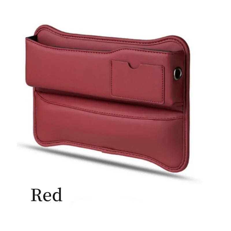 a red leather wallet with a black leather handle