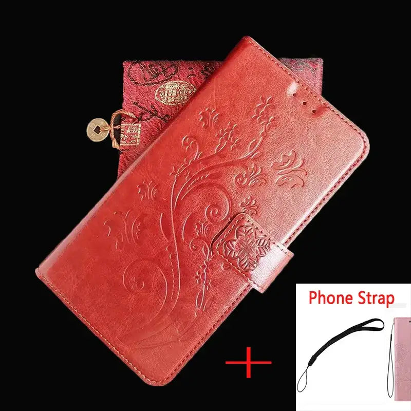 a red leather wallet case with a phone strap