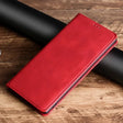 Red leather wallet-style phone case with a folding cover.