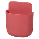 A red plastic cup holder