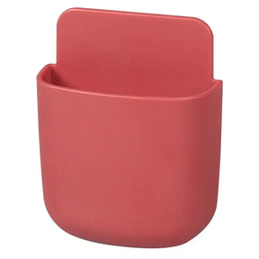 A red plastic cup holder