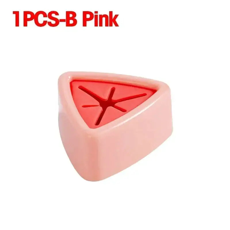 a red plastic stamp with a red star on it