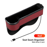 a red seat organizer with a black handle