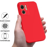 Red smartphone case with dual camera cutouts being held in a hand.