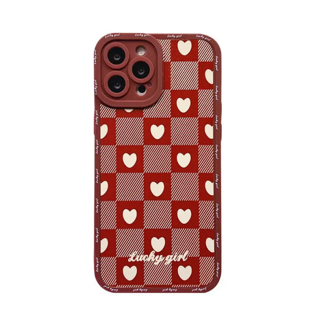 A red and white iphone case with hearts