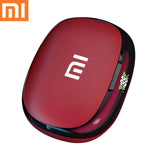 Red Xiaomi-branded portable electronic device with a smooth, rounded shape.